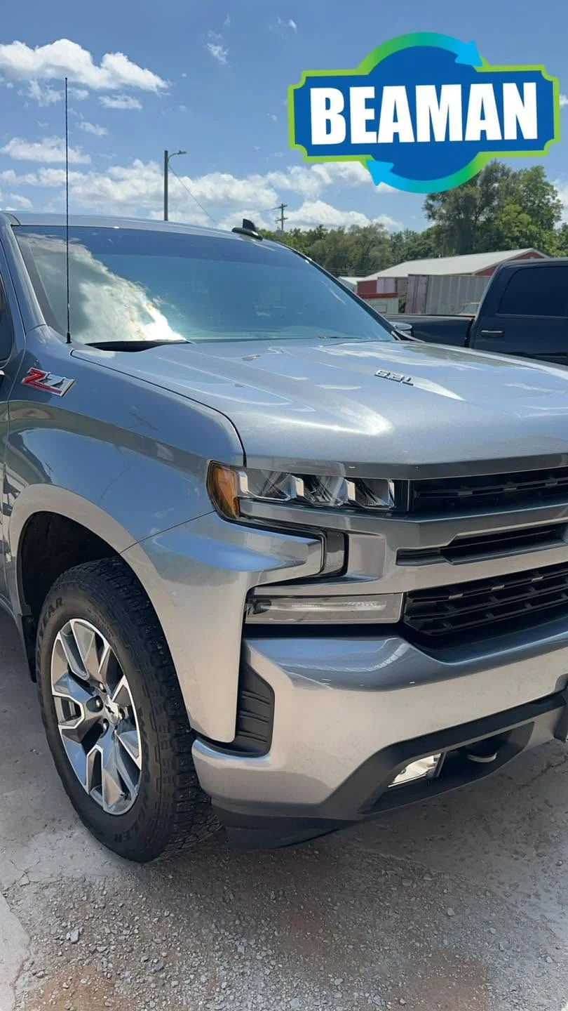 Silver Chevrolet Silverado RST Z71 pickup, front close-up view