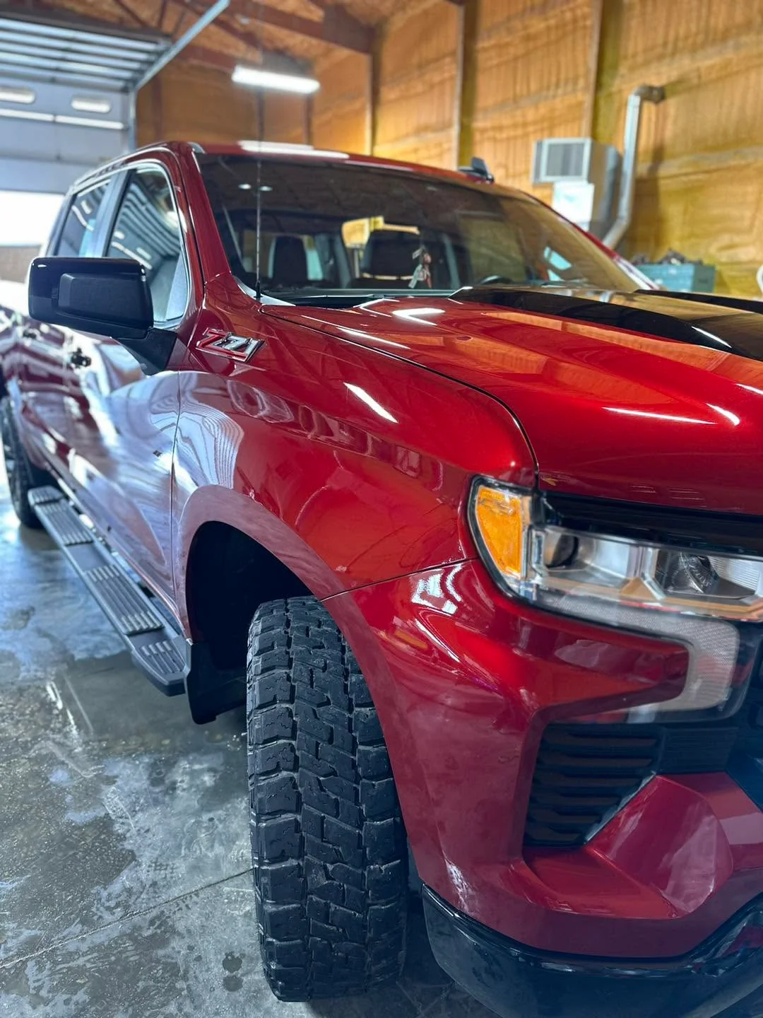 Red Chevrolet Silverado Z71 pickup, front three-quarter close-up