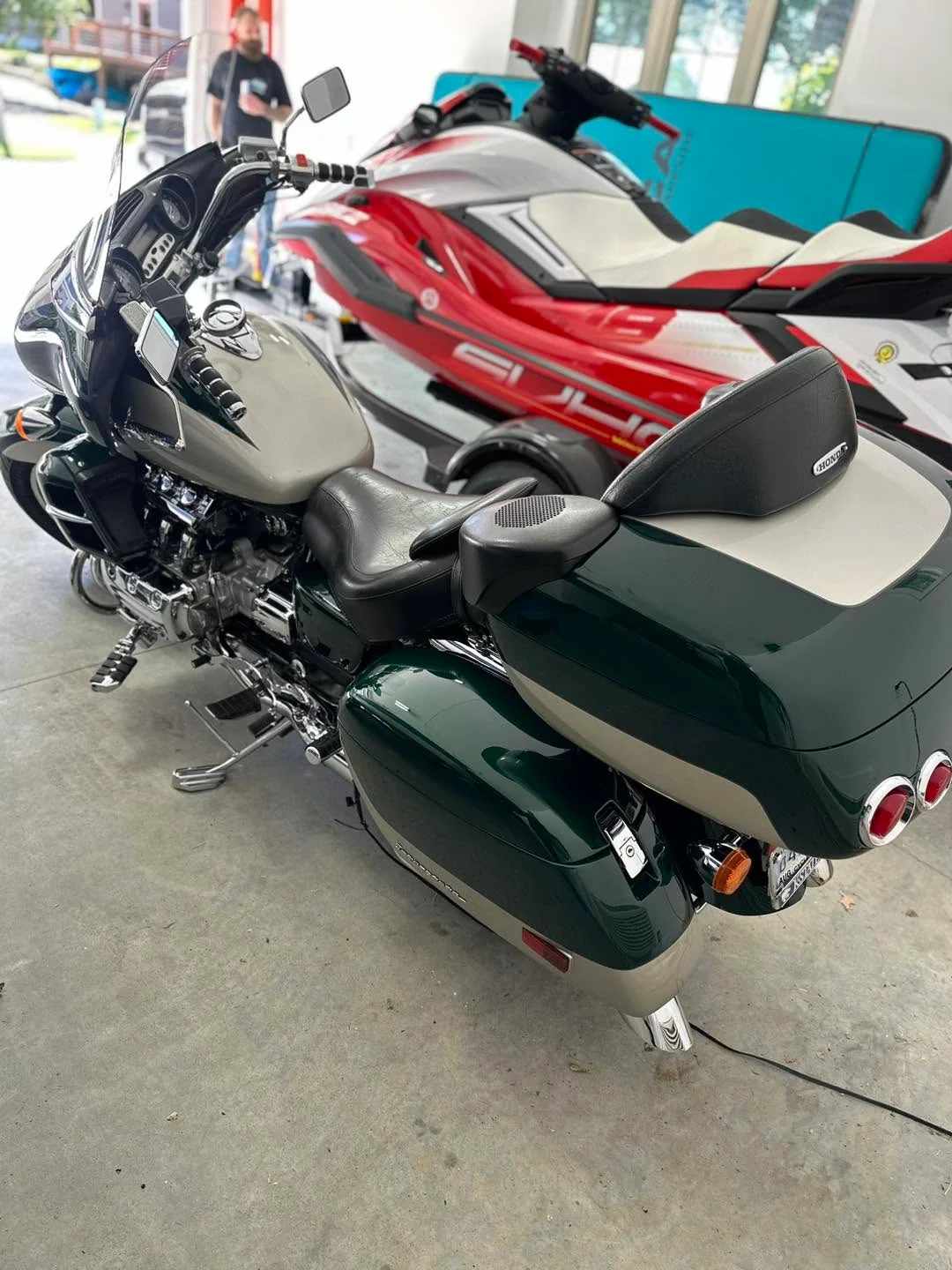 Green Honda Valkyrie touring motorcycle, rear view