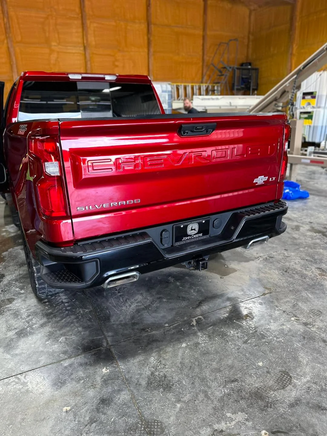 Red Chevrolet Silverado LT pickup, rear tailgate view