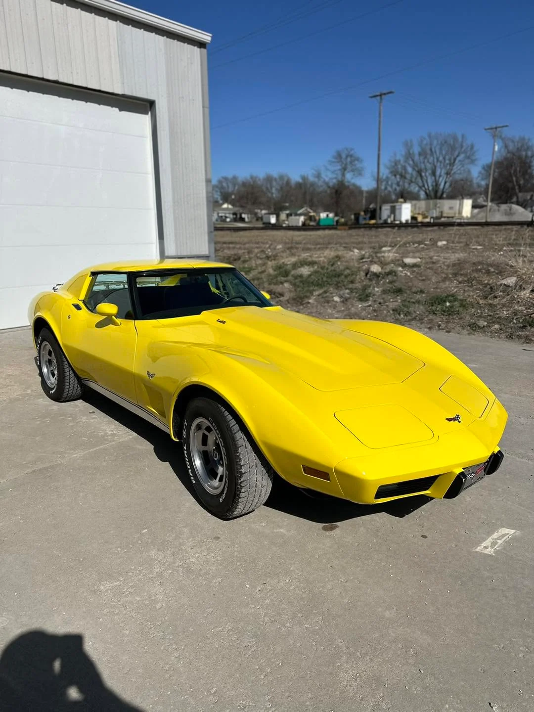 Yellow Chevrolet Corvette C3, front three-quarter view