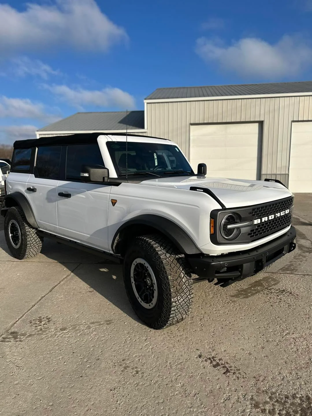 White Ford Bronco Badlands SUV, front three-quarter view