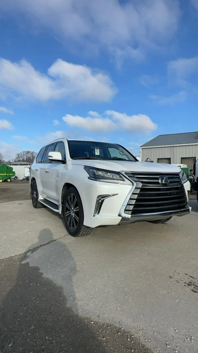 White Lexus LX SUV, front three-quarter view outdoors