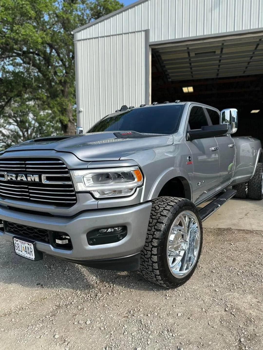 Silver Ram 3500 Laramie dually pickup truck, front three-quarter view
