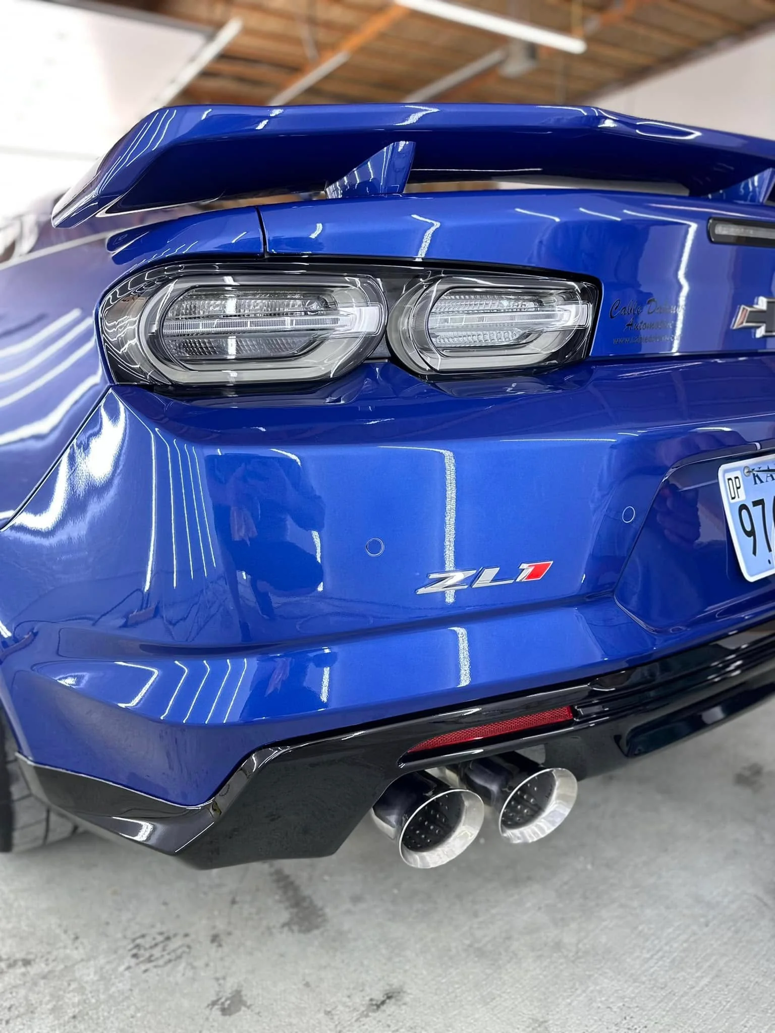 Blue Chevrolet Camaro ZL1, close-up rear view
