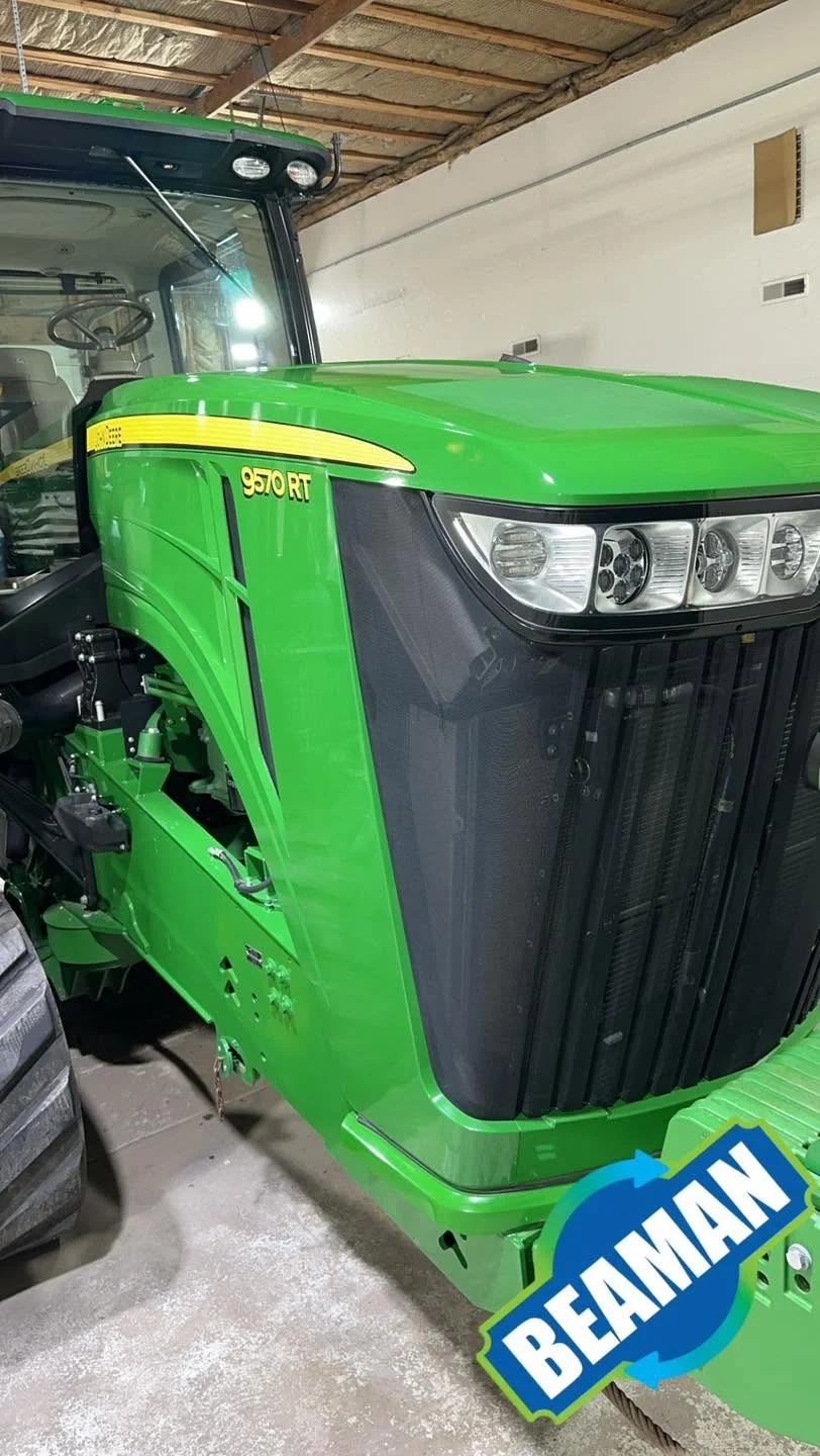 Green John Deere 9570RT tracked tractor, front three-quarter view