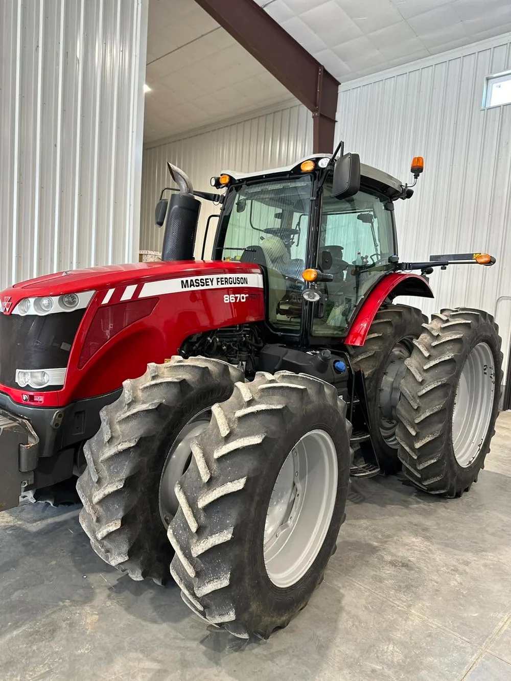 Freshly paint-corrected and ceramic-coated Massey Ferguson 8670 tractor
